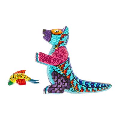 Alternate image for Handcrafted Turquoise Copal Wood Otter and Fish Figurine Turquoise River Days