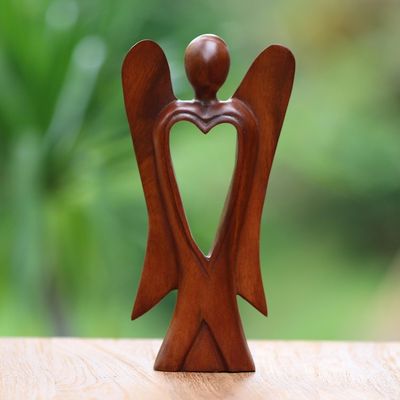 Alternate image for Hand Carved Wood Figurine of an Angel with Heart Feature Heart of an Angel