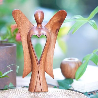Alternate image for Hand Carved Wood Figurine of an Angel with Heart Feature Heart of an Angel
