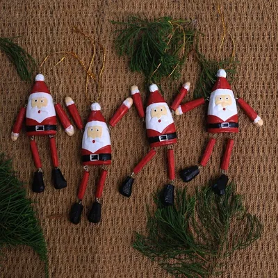 Alternate image for Dangling Wood Santa Ornaments from Bali Set of 4 Dancing Santas