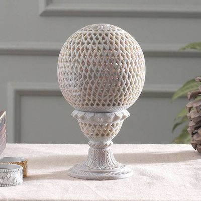 Alternate image for Globe-Shaped Openwork Hand-Carved Soapstone Tealight Holder Reflection from the Past