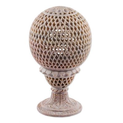 Alternate image for Globe-Shaped Openwork Hand-Carved Soapstone Tealight Holder Reflection from the Past