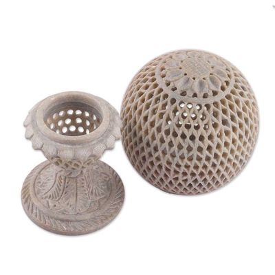 Alternate image for Globe-Shaped Openwork Hand-Carved Soapstone Tealight Holder Reflection from the Past